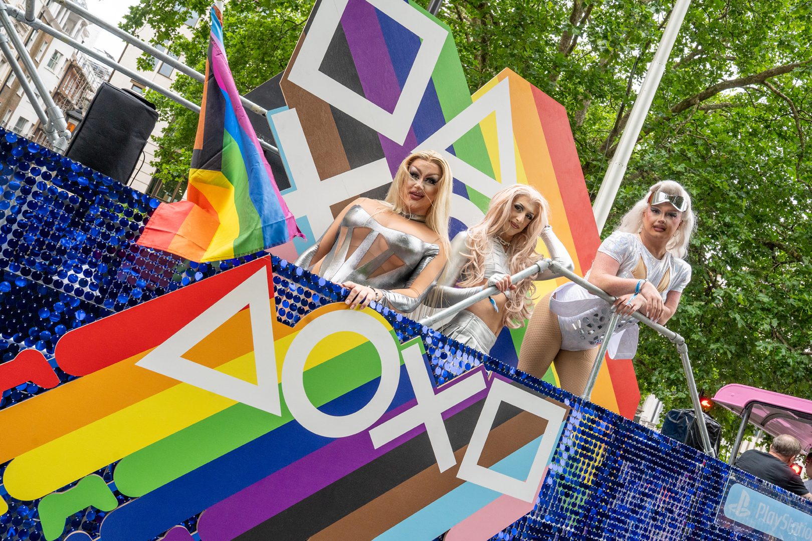 Drag artists Eden Queen, Lucy Caboosi, and Brenda Rant on a PlayStation float at the London Pride parade.