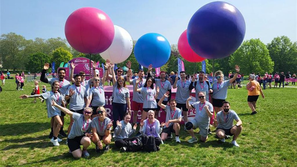 Artboard 1.jpg An outdoor group photo of employees that participated in Race for Life 2024